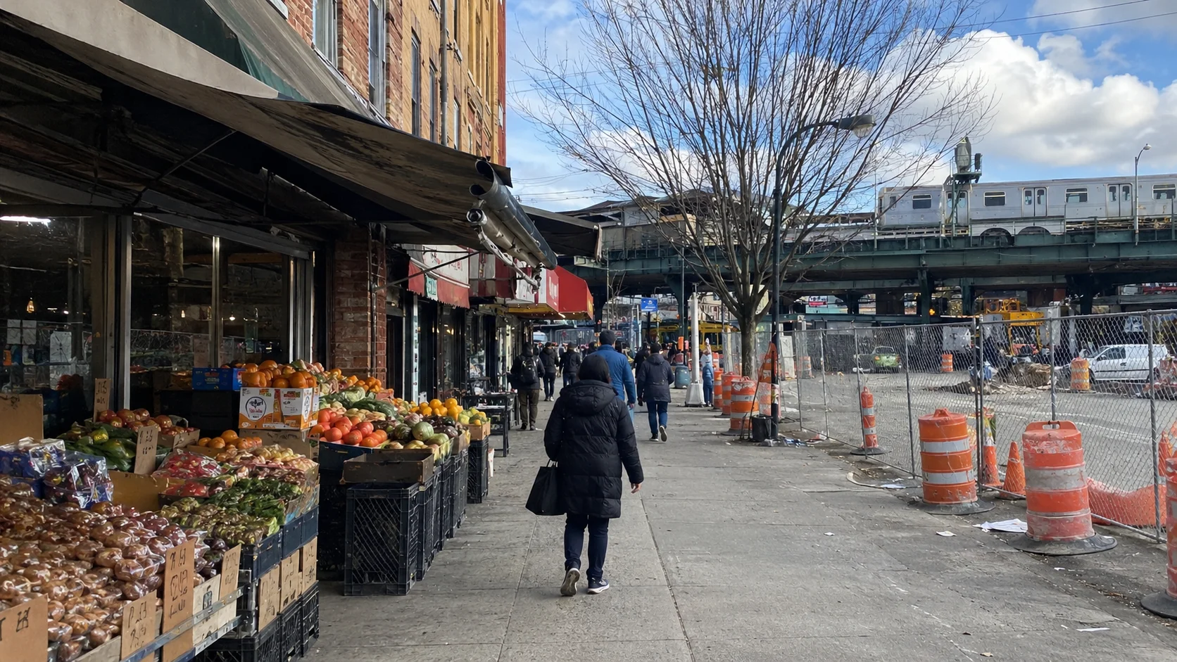 New apartment towers under construction along western Queens transit routes.